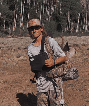 wearing sling with archery buck deer