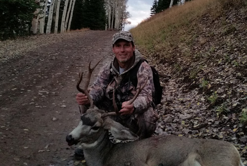 muzzleloader hunting deer, four point buck