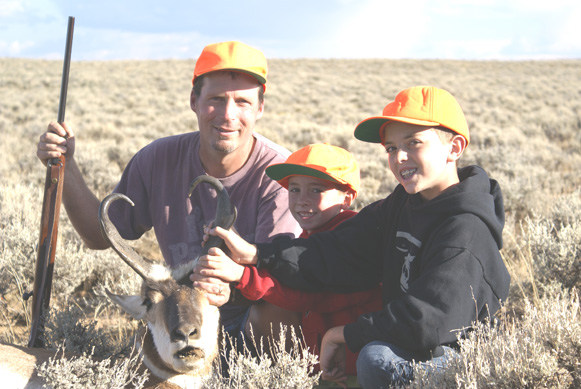 kids with antelope buck