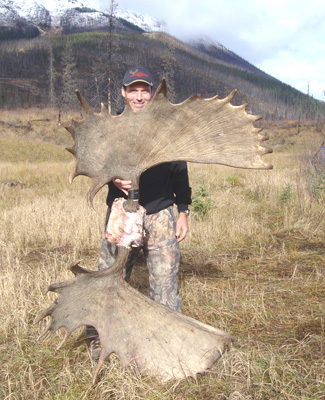 I went hunting moose, Alaska-Yukon Moose Antler spread almost as tall as me...